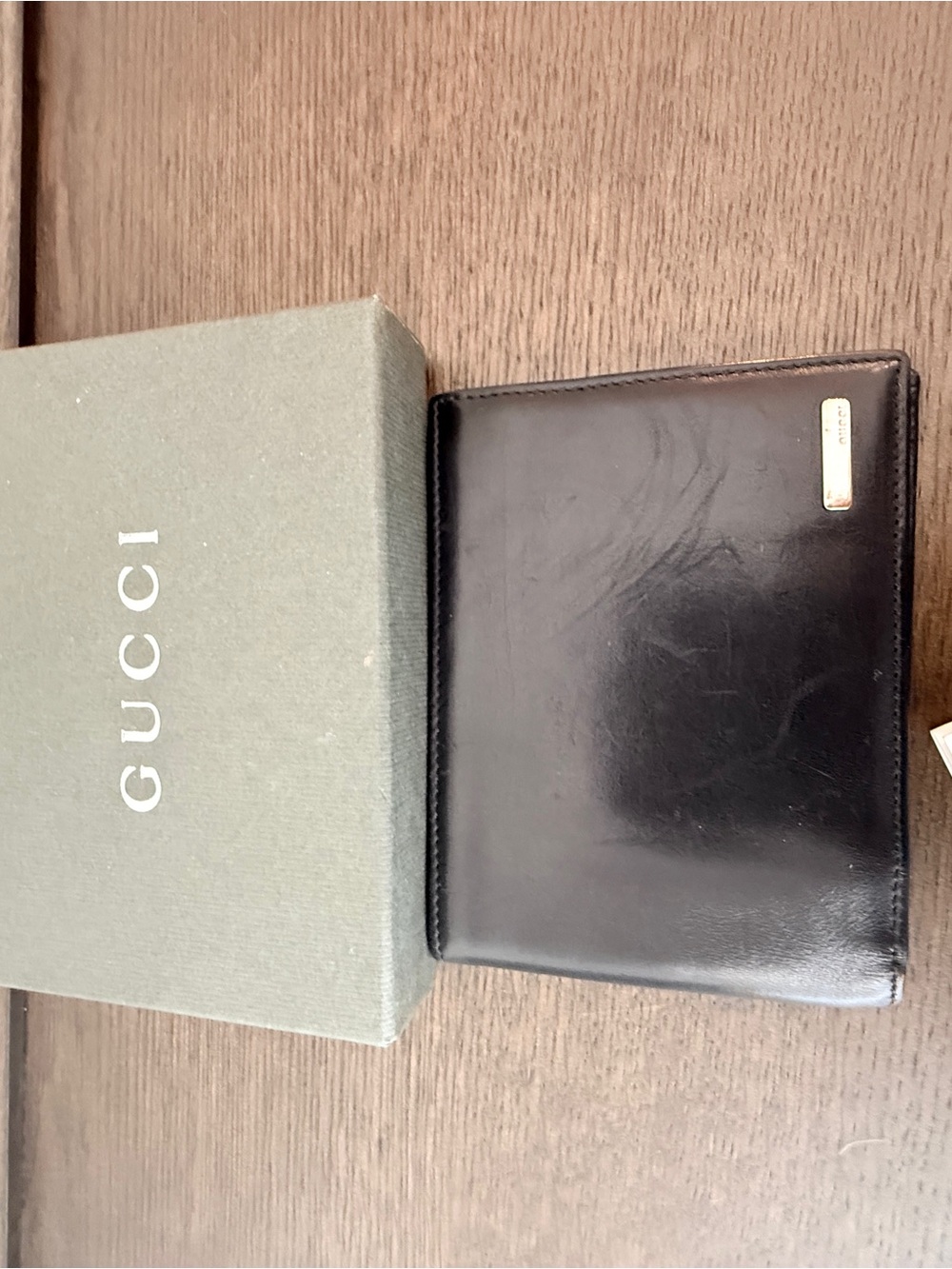 Gucci Black Smooth Leather Bifold Wallet with Metal Plaque